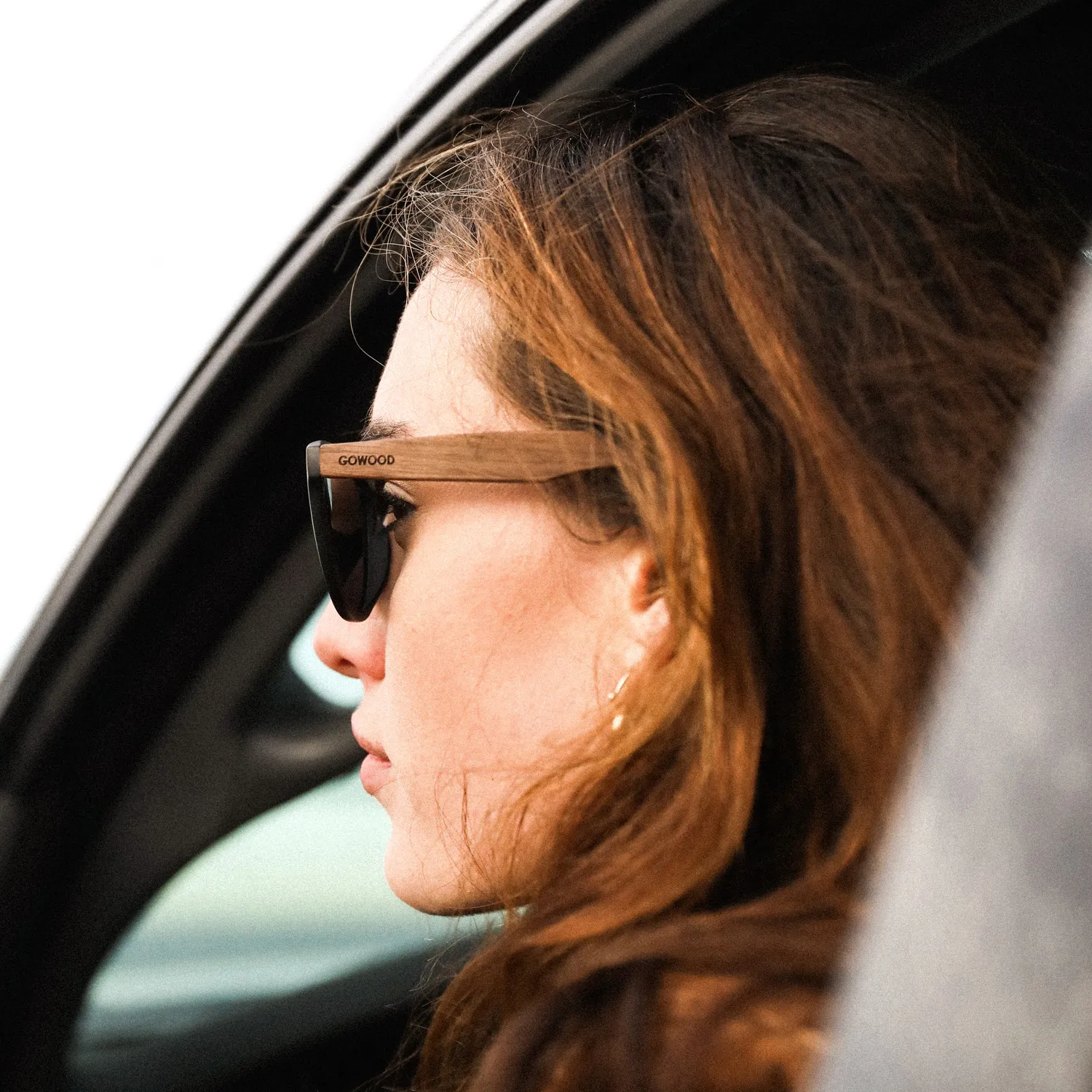 Classic walnut wood sunglasses with silver mirrored polarized lenses